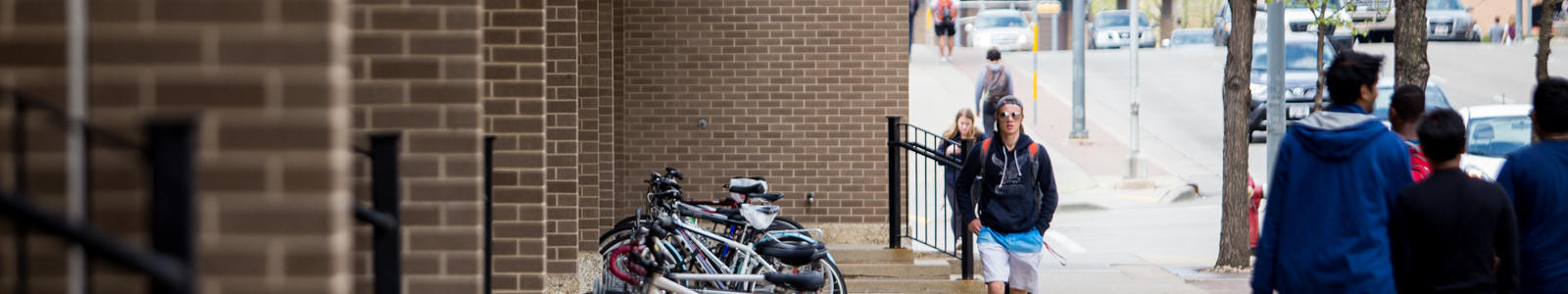 students walking outside of the Educational Sciences building