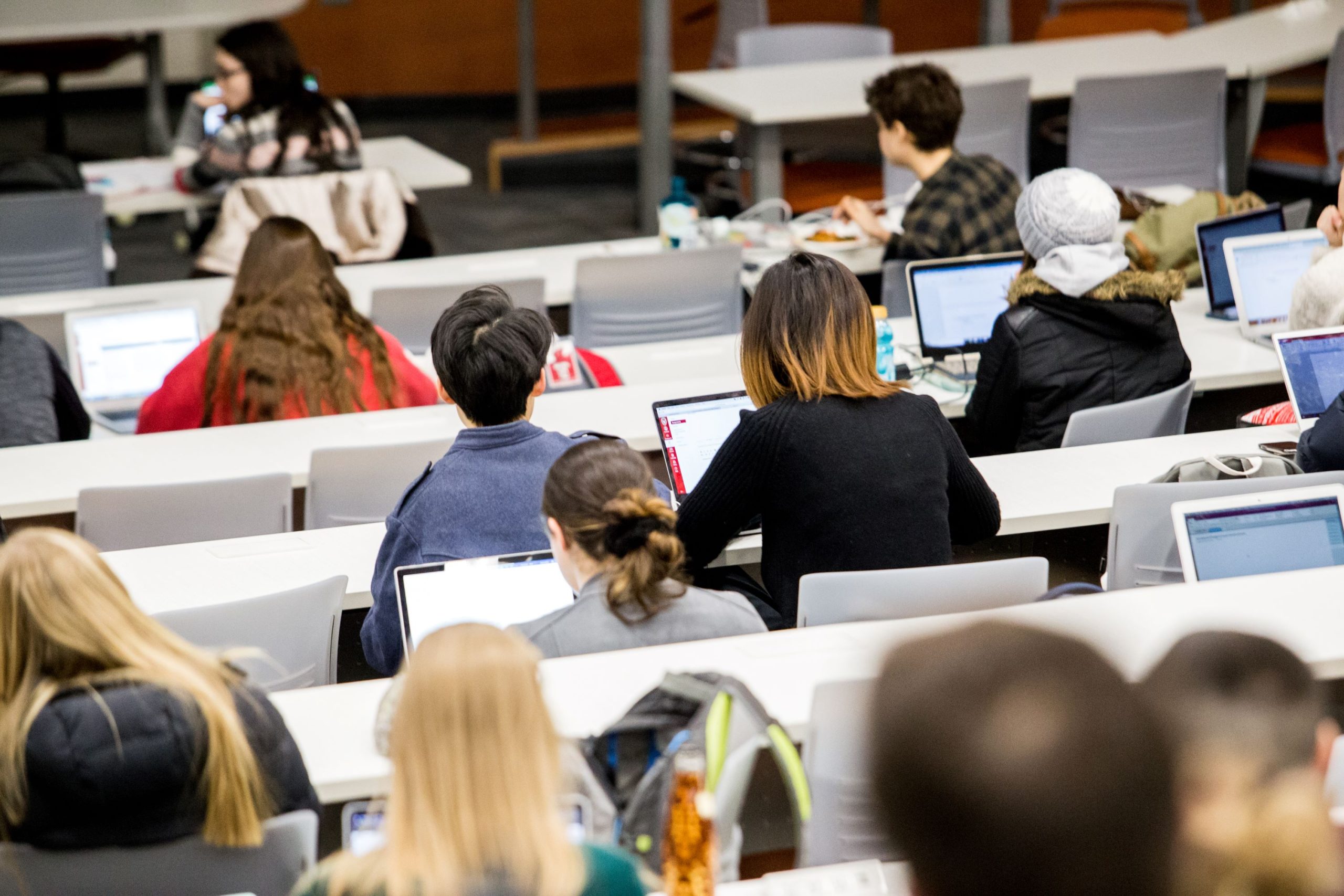students in a lecture hall studying